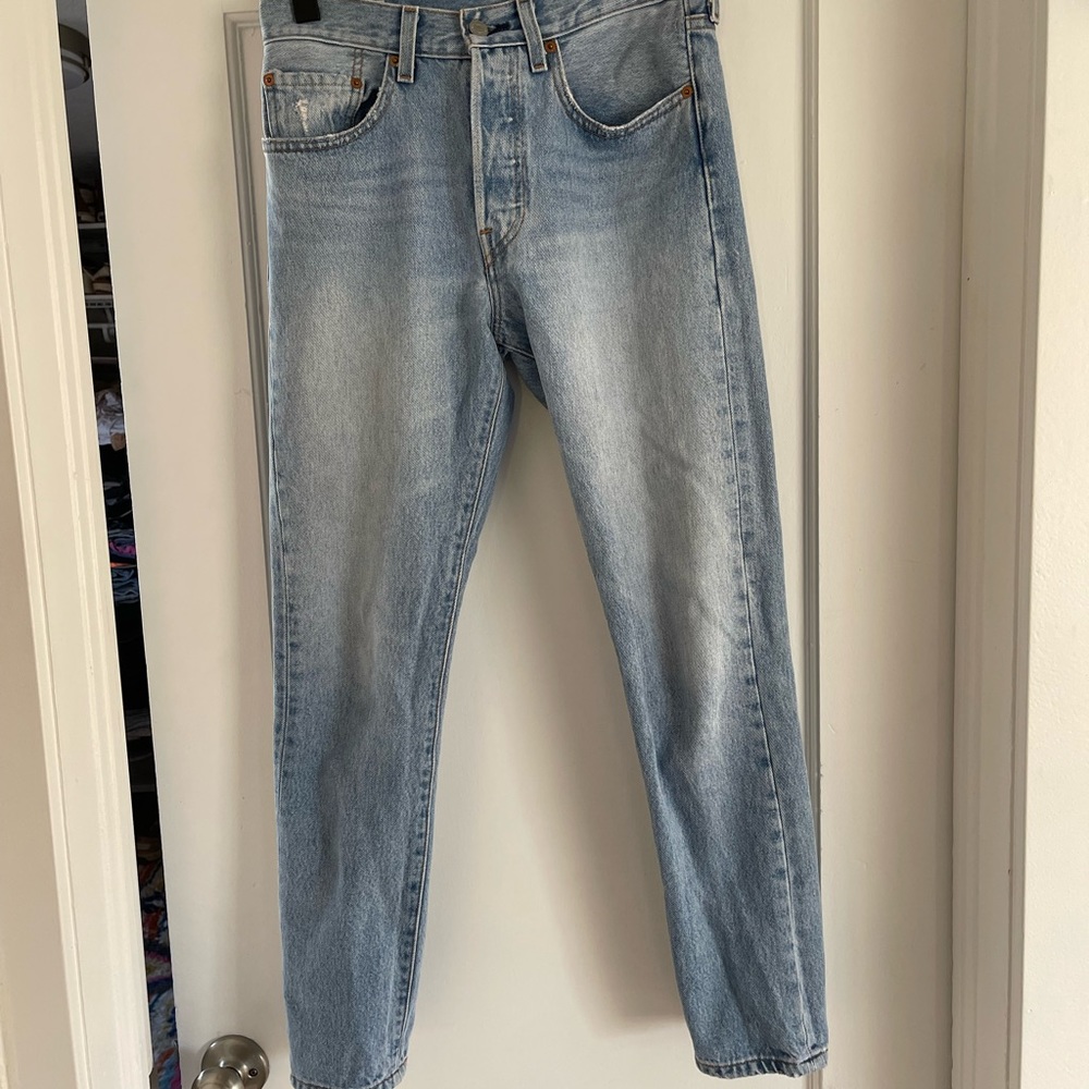 Levi’s 501s. Size 26, length 28.